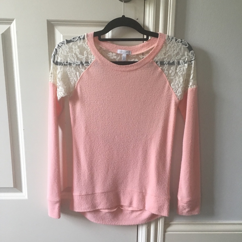 Delia’s pink, lace back sweater